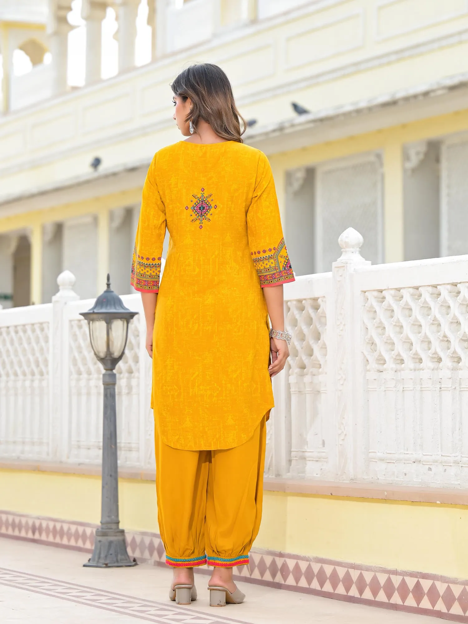 Juniper Mustard Ethnic Motif Printed Kurta, Pant And Dupatta Set With Tassels & Buttons.