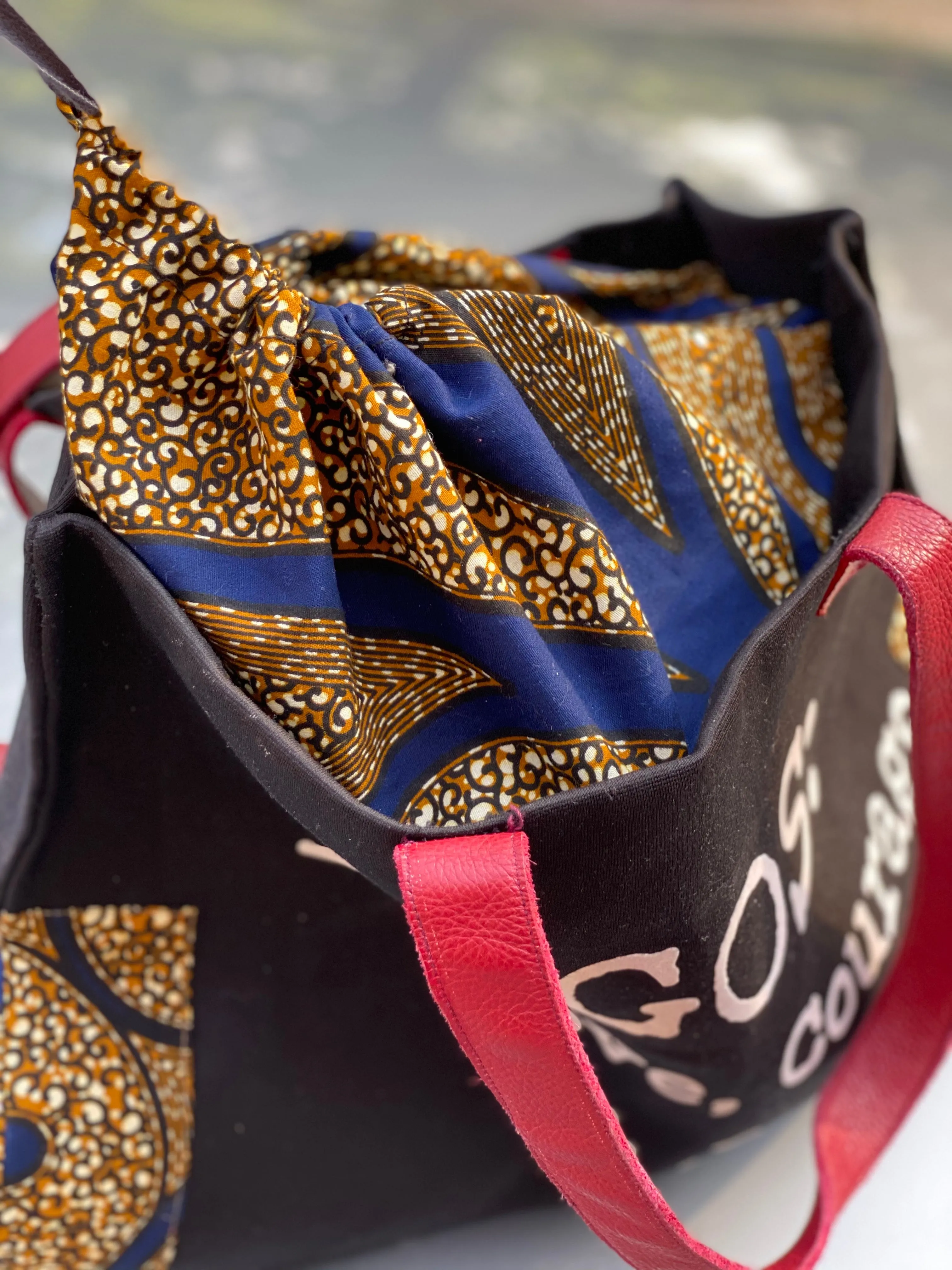 Trapezoid Leather Trim Tote: LAGOS: Love, Courage &Jollof