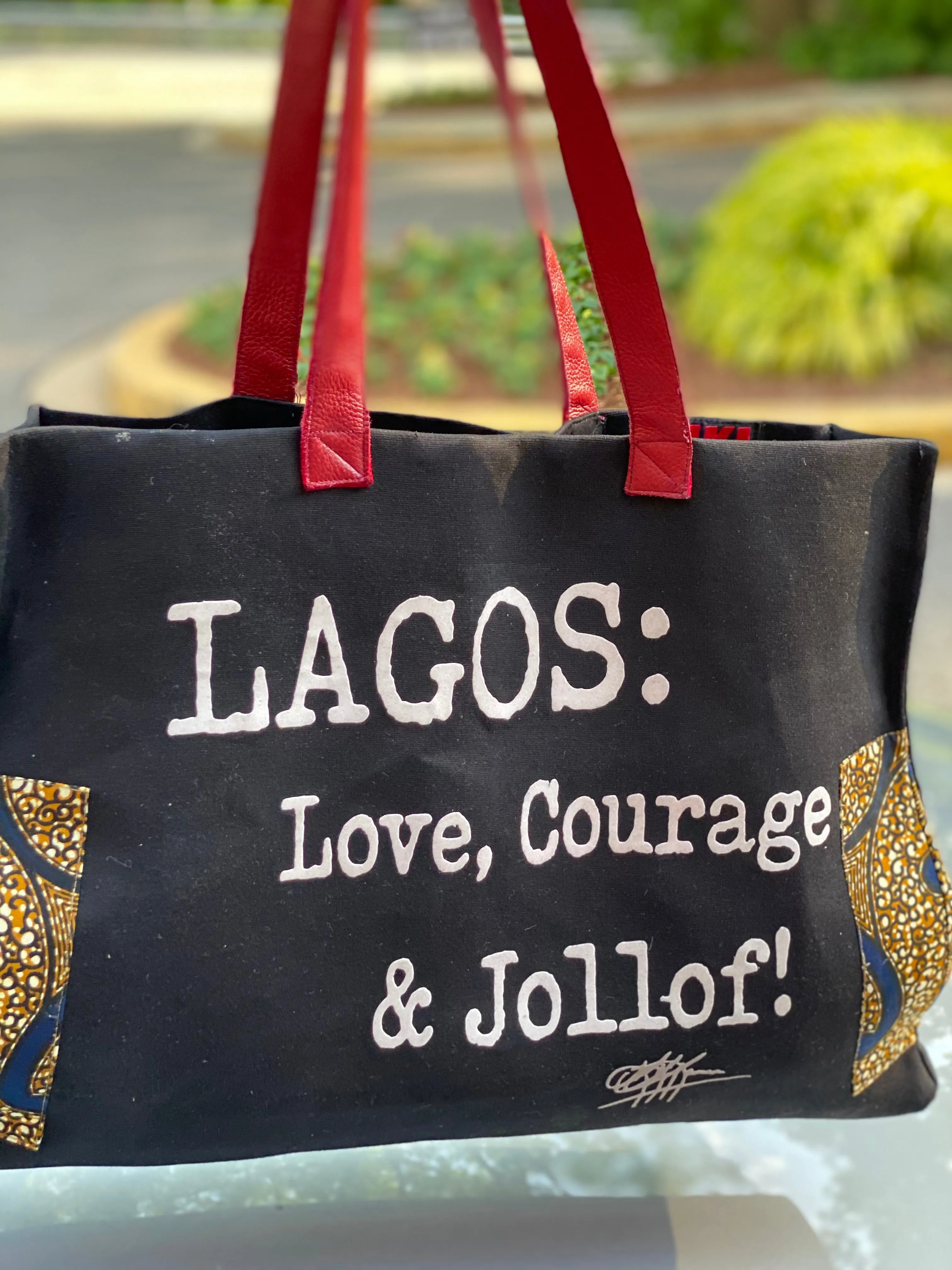 Trapezoid Leather Trim Tote: LAGOS: Love, Courage &Jollof